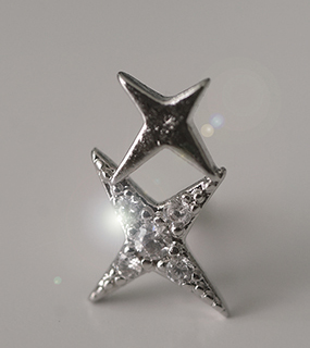 Two sparkle star piercing